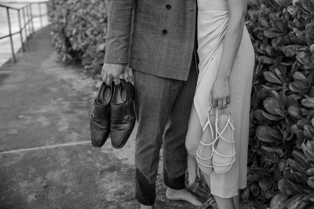 couple taking engagement photos in Waikiki