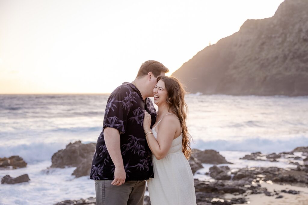 couple taking engagement photos on Oahu, Hawaii with Iwalani Photography